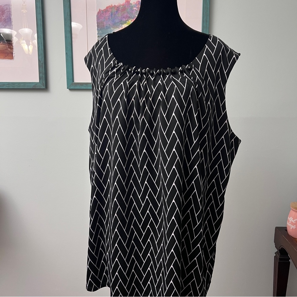 Black and white with embellishment around neck shell